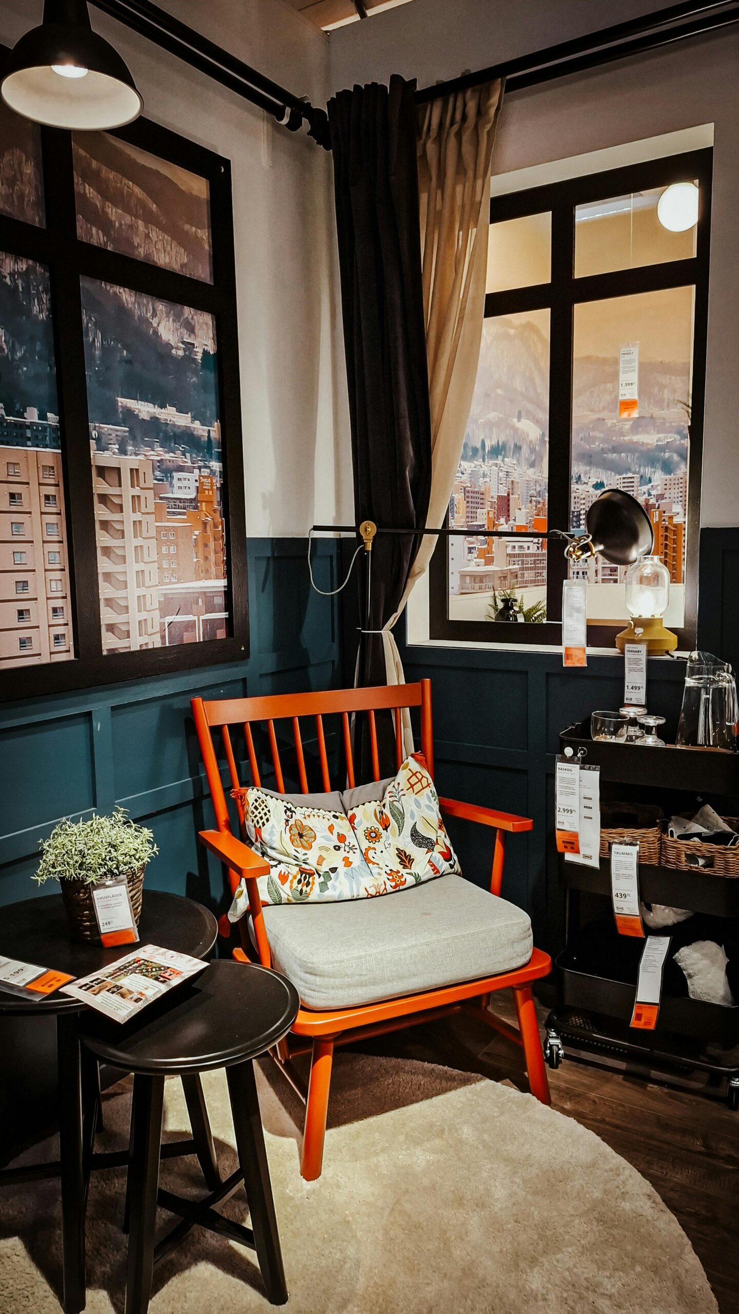 Stylish living room setup with chair, table, and mountain view.
